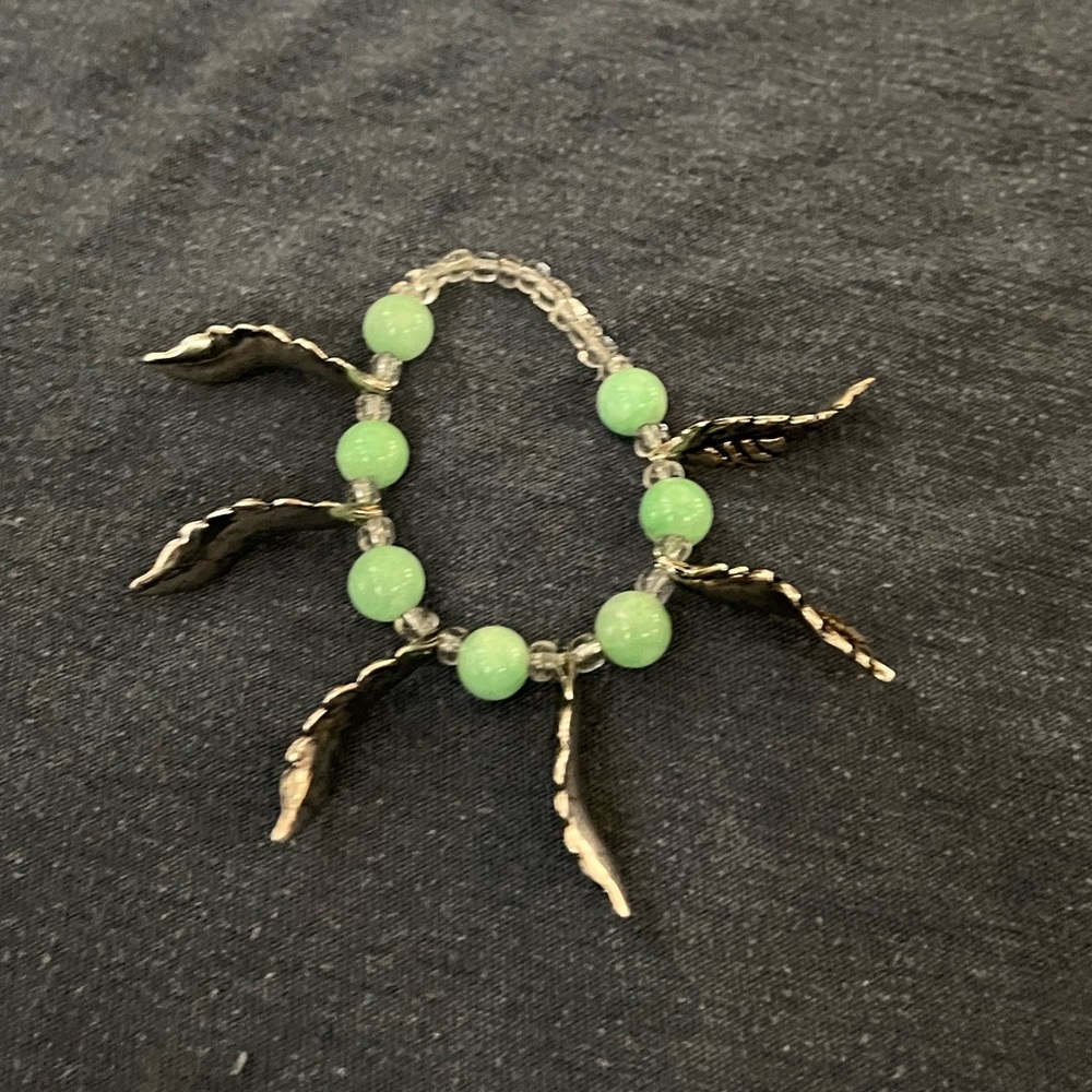 Feather charm bracelet